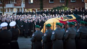 Paying their last respects in front of Hamburg's St. Michael's Church