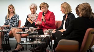 Chancellor Angela Merkel during a panel discussion as part of the Woman20 Summit
