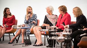 Ivanka Trump sits next to IMF Managing Director Christine Lagarde during a panel discussion at the Women20 Summit.