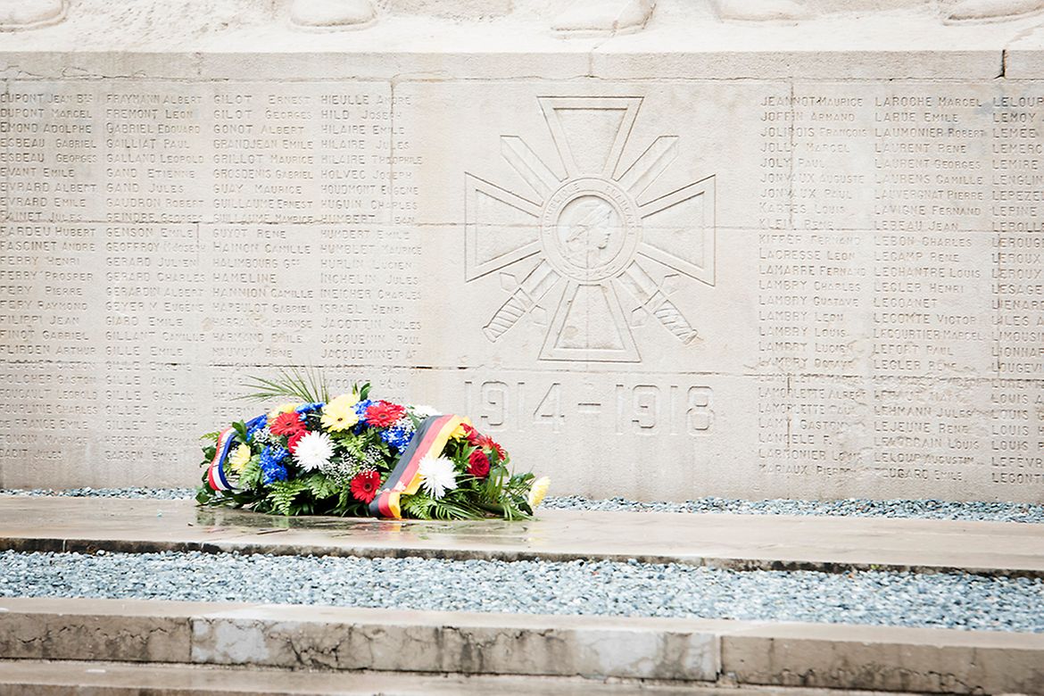A wreath lies on the monument to the children killed in the town of Verdun.