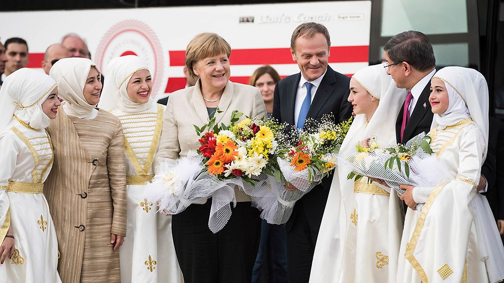 Chancellor Angela Merkel visits a refugee project in Turkey.
