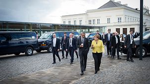 President Barack Obama and Chancellor Angela Merkel on their way to the official opening of this year's Hannover Messe