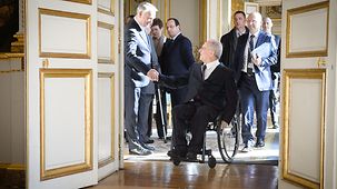 Wolfgang Schäuble, Federal Minister of Finance, is welcomed.