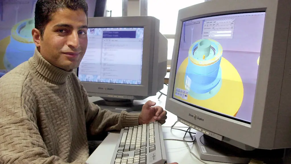 A Jordanian engineer at his computer workplace