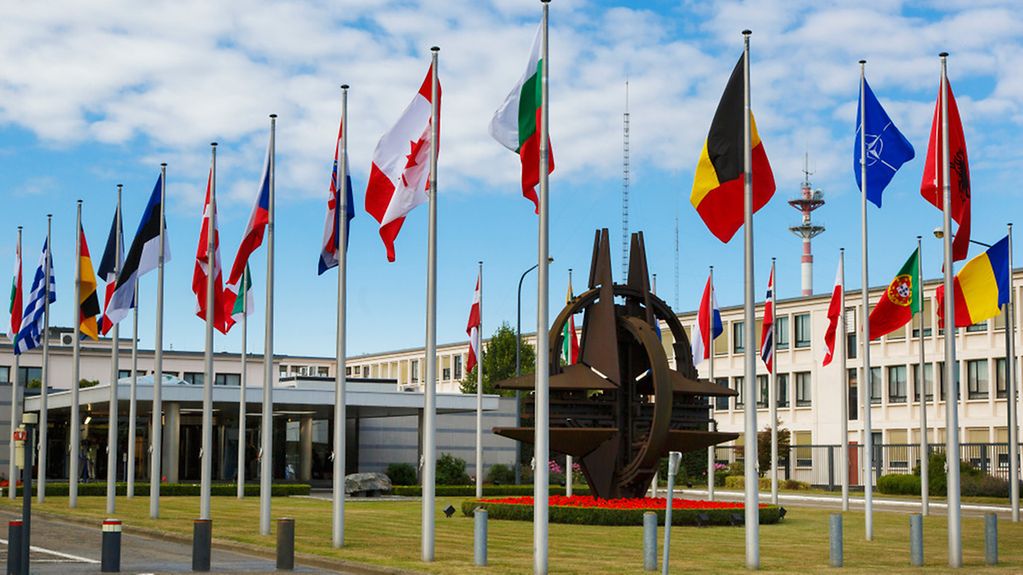 NATO headquarters in Brussels with the flags of member states