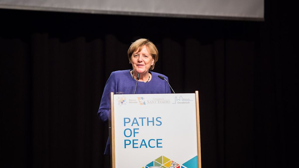 Chancellor Merkel giving a speech