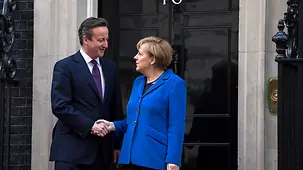 Prime Minister David Cameron welcomes Chancellor Angela Merkel to Downing Street.