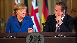 Bundeskanzlerin Angela Merkel und Großbritanniens Premierminister David Cameron auf gemeinsamer PK.