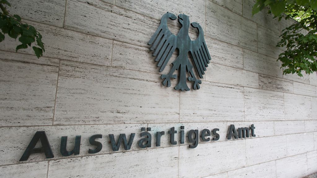 'Auswärtiges Amt' is written on the outside wall of the Federal Foreign Office in Berlin.
